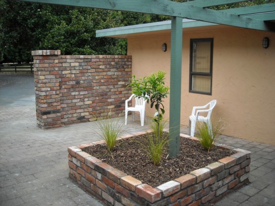 brick wall and raised bed built from recycled brick