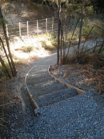 timber and gravel steps in a rural setting